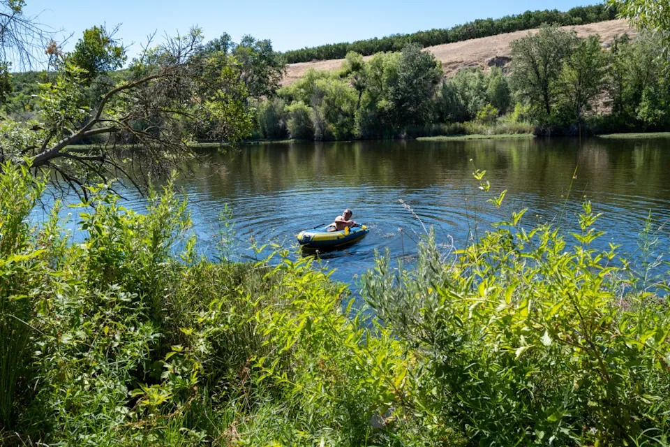 A boater enjoys a day in a park on the outskirts of the city on July 4, 2022 in Fresno. Getty Images