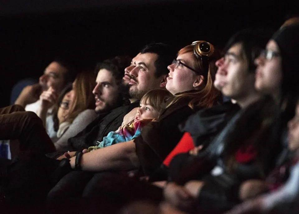 Moviegoers watch the start of “Star Wars: Episode VII – The Force Awakens” in Modesto.