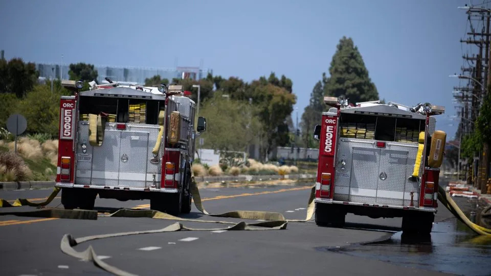 Fire trucks park in front of GKN Aerospace in Garden Grove on Saturday. - Mindy Schauer/Orange County Register/MediaNews Group/Getty Images