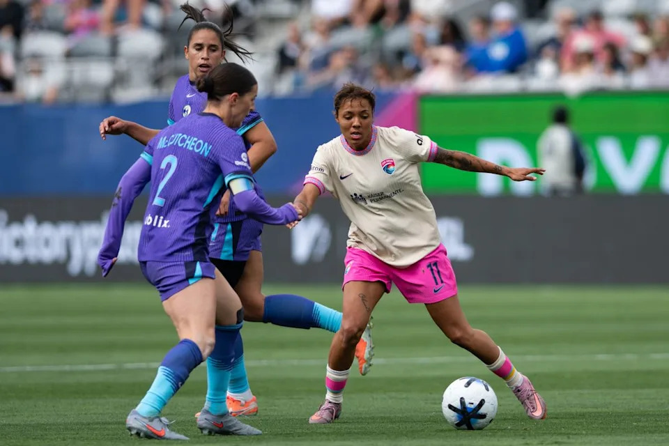 San Diego Wave midfielder Gia Corley (11) controls possession during an NWSL match between Orlando Pride SC and San Diego Wave FC on Sunday, May 24, 2026 at Snapdragon Stadium in San Diego Calif.