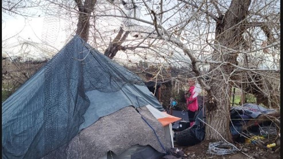 Bakersfield Police and other authorities, such as park rangers, work to clear out homeless encampments along the Kern River bed in Bakersfield on Wednesday, Feb. 19, 2025. PHOTO: BPD