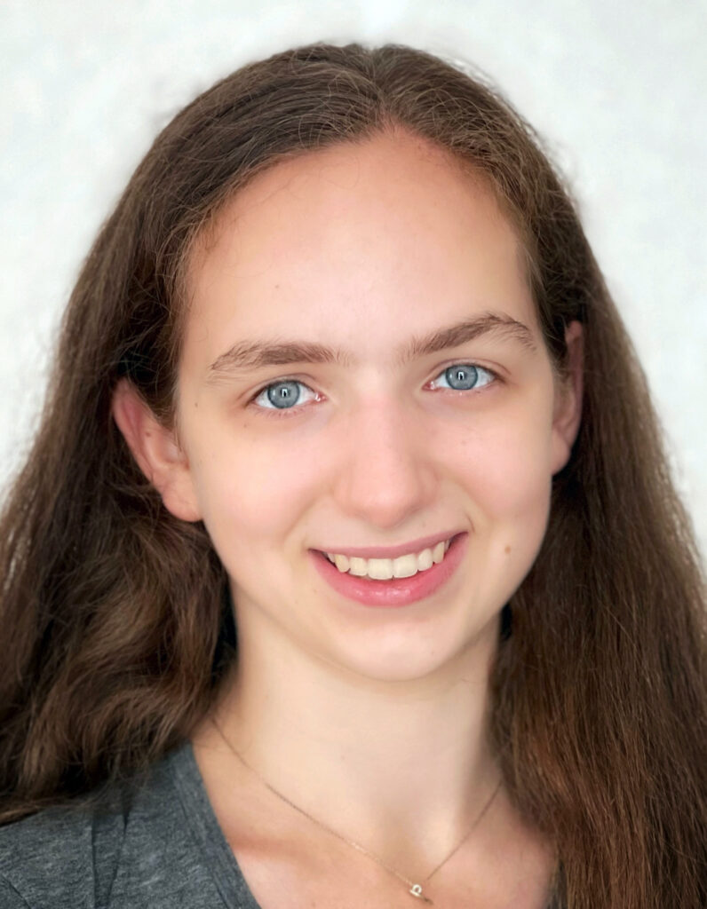 headshot of Eli Gendreau-Distler against a neutral off-white background