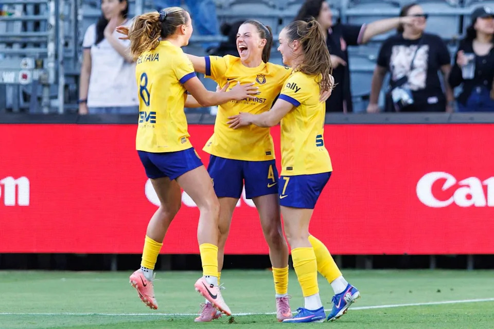 Utah Royals players celebrate after a goal was scored during an NWSL match against Angel City FC on May 2, 2026 at BMO Stadium in Los Angeles, California.