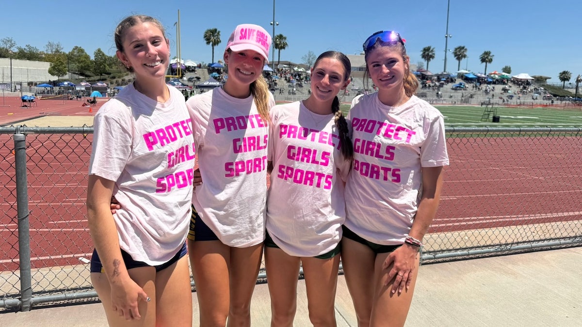 California high school girls wearing Protect Girls Sports shirts at track meet