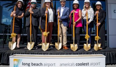 A line of people with golden shovels