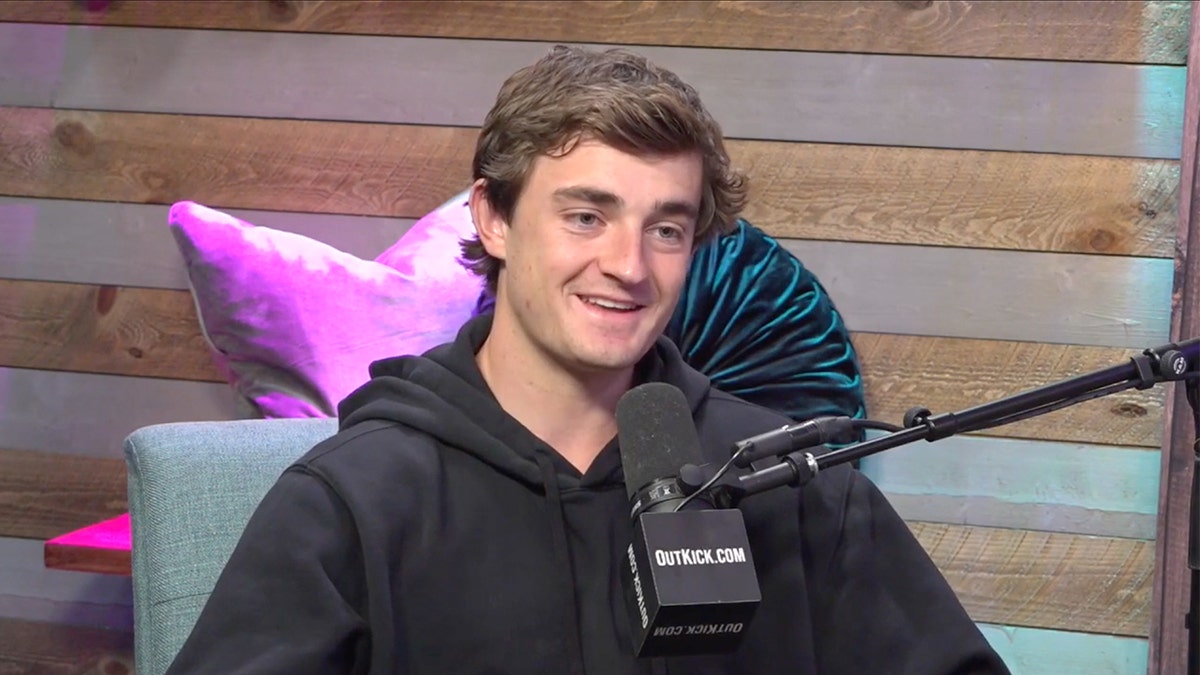 Independent journalist Nick Shirley seated during an interview with Riley Gaines