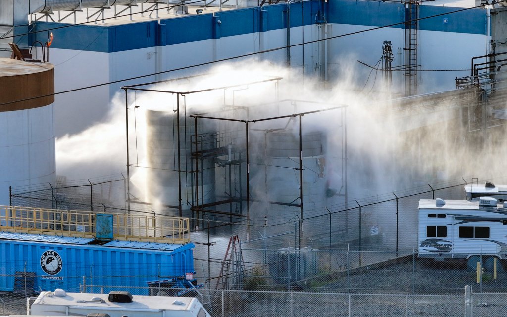 Water spraying a pressurized tank filled with methyl methacrylate at GKN Aerospace.