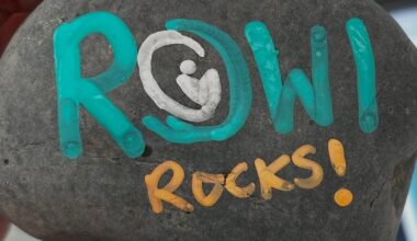 rock with rowi written