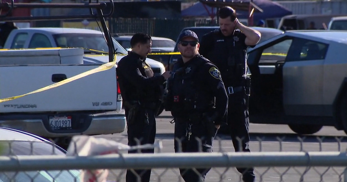 Father, son charged in Oakland flea market killing