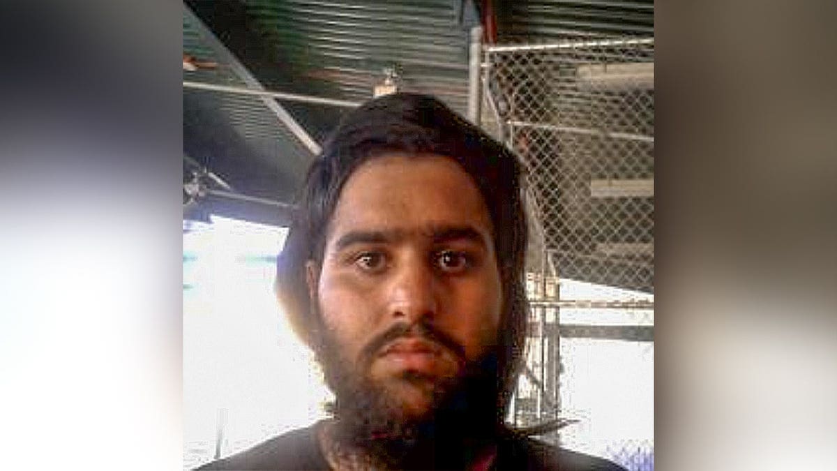 Close-up mugshot of Manvir Singh