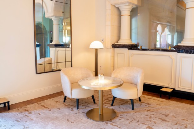 A cafe table in the new new champagne lounge at Addison by William Bradley, a Michelin three-star restaurant in San Diego's Carmel Valley, on Friday, May 22, 2026. The restaurant, celebrating its 20th anniversary this year, reopened May 19 after a 52-day renovation.  (Nelvin C. Cepeda / The San Diego Union-Tribune)