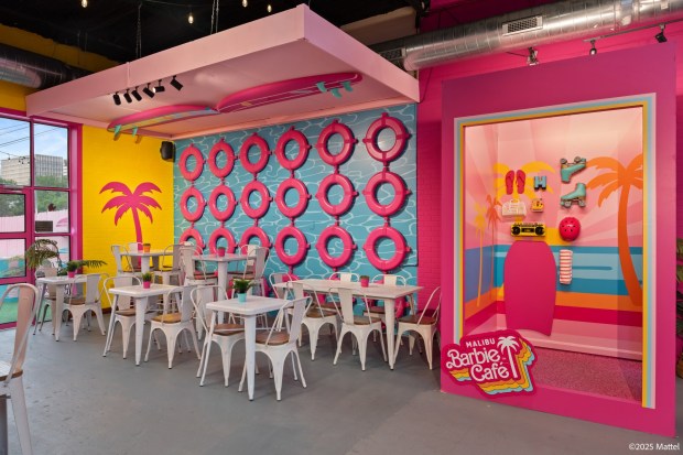 A dining area and Instagram/TikTok selfie station at Bucket Listers' pop-up Malibu Barbie Cafe, which visited San Diego in 2025. The company will install a new concept, the Candy Land Café, in San Diego in July. (Bucket Listers)