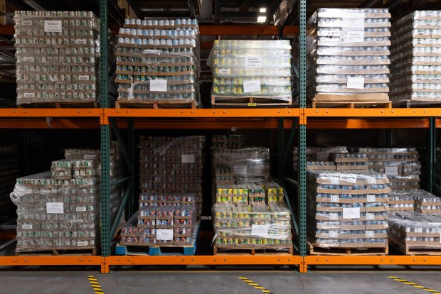 Canned and boxed food on pallets waiting to be distributed at Father Joe's Villages on Friday, May 29, 2026, in San Diego. (Luke Johnson / The San Diego Union-Tribune)