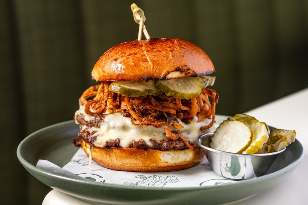 The Lamb Smash burger, featuring New Zealand beef, at Queensland Del Mar, opening Thursday, May 21, in Del Mar. (Kimberly Motos)