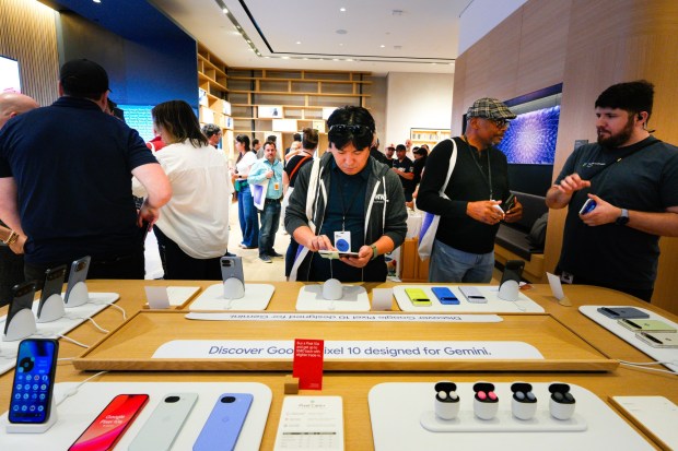 San Diego's first Google Store opened on Thursday, May 7, 2026, at Fashion Valley Mall in San Diego, CA. Paul Chung of the Talmadge community looked over a Pixel 10 Pro Fold phone during the grand opening. (Nelvin C. Cepeda / The San Diego Union-Tribune)