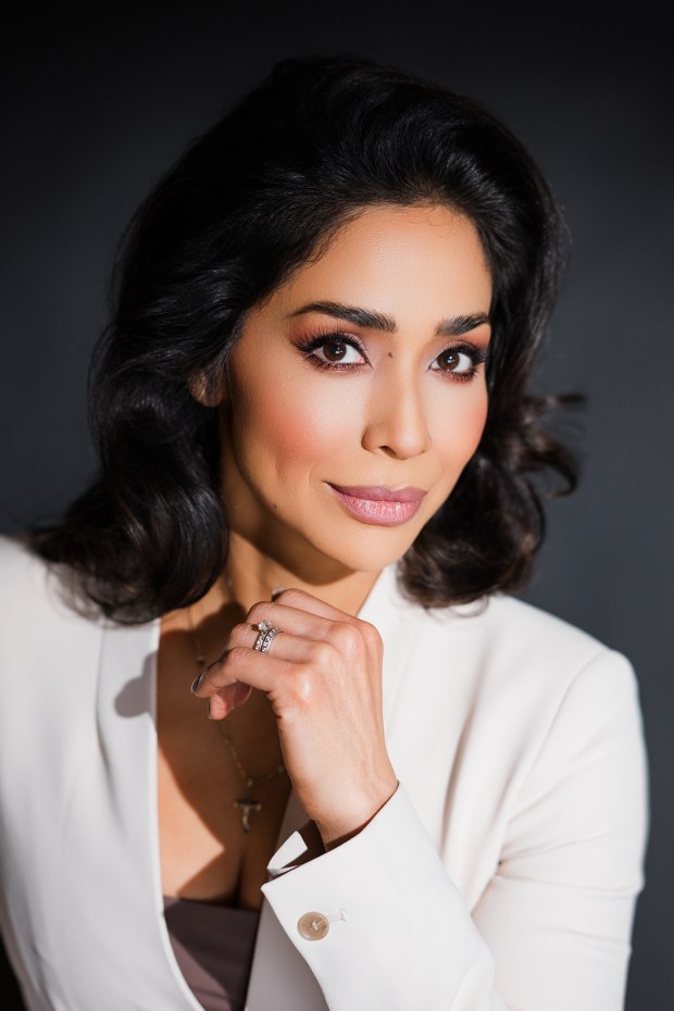 San Diego mezzo-soprano Guadalupe Paz said winning the first of three prizes at the Musical Merit Foundation vocal competition in 2012 was "life-changing." (Karla Audelo)