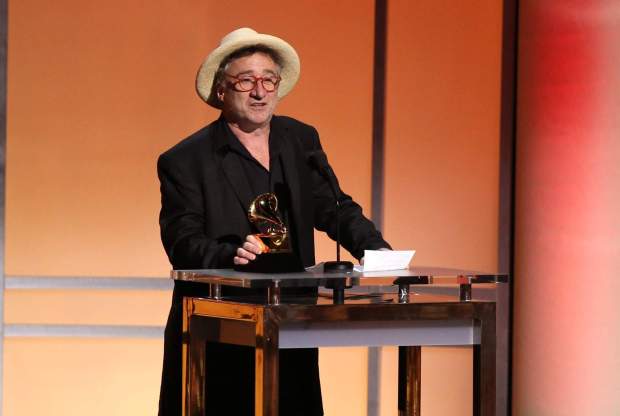 Jon Cleary accepts the Grammy award for Best Regional Roots Music Album for "Go Go Juice" at the 58th annual Grammy Awards in 2016, in Los Angeles. (Matt Sayles/Invision/AP)