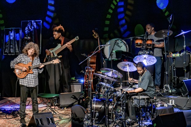 Guitar great Pat Metheny, at left, is now on tour with his Side-Eye+ band, which features San Diego singer/percussionist Leonard Patton, top right. (Jeffrey Moeller/Tampa Bay Music News)
