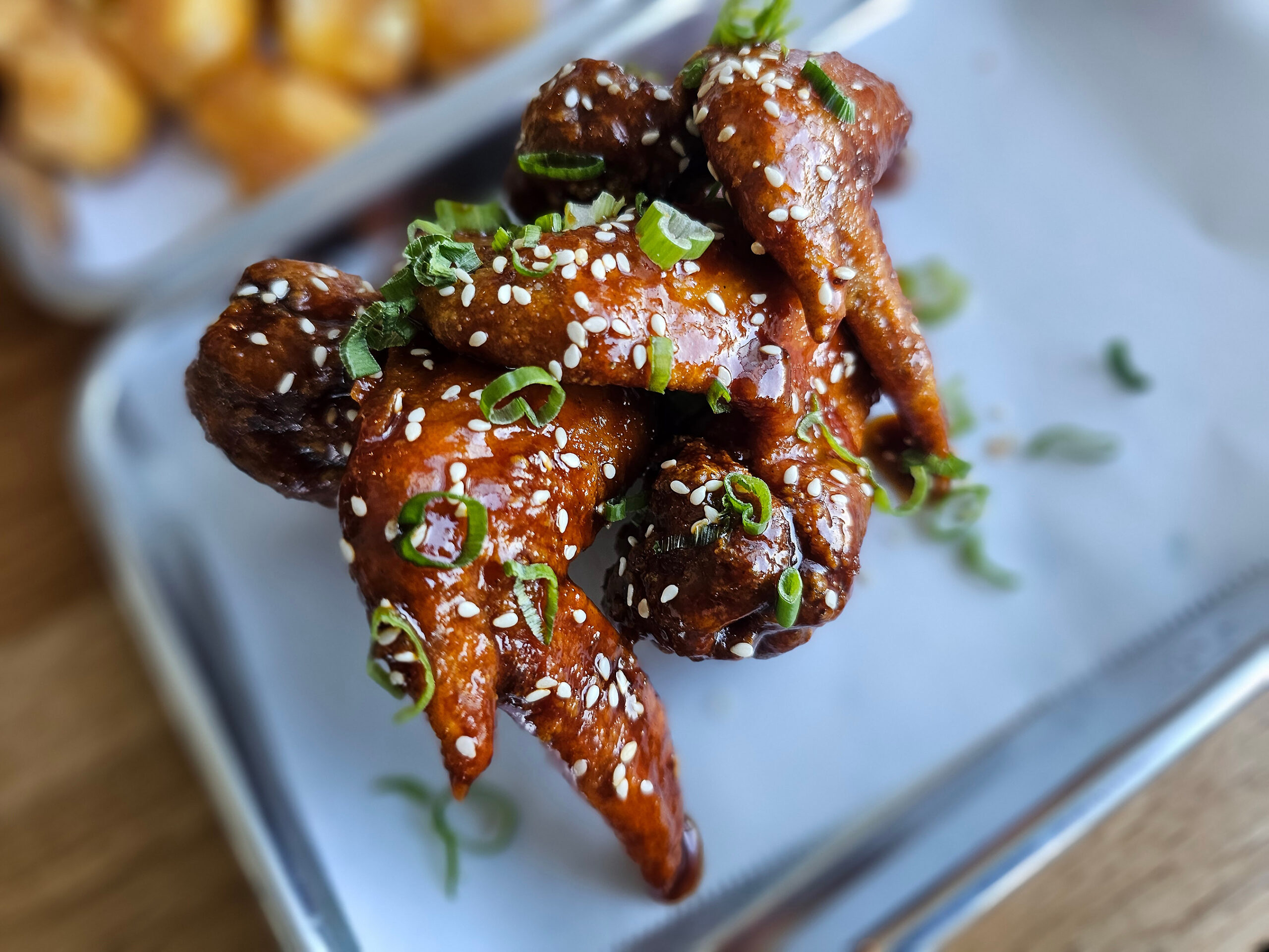Gochujang chicken wings at The Junction in Santa Rosa. (Heather Irwin / The Press Democrat)
