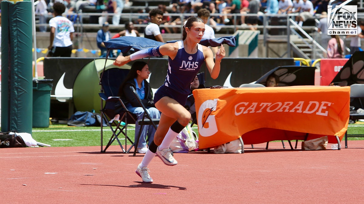 Transgender student athlete AB Hernandez running in a track and field event
