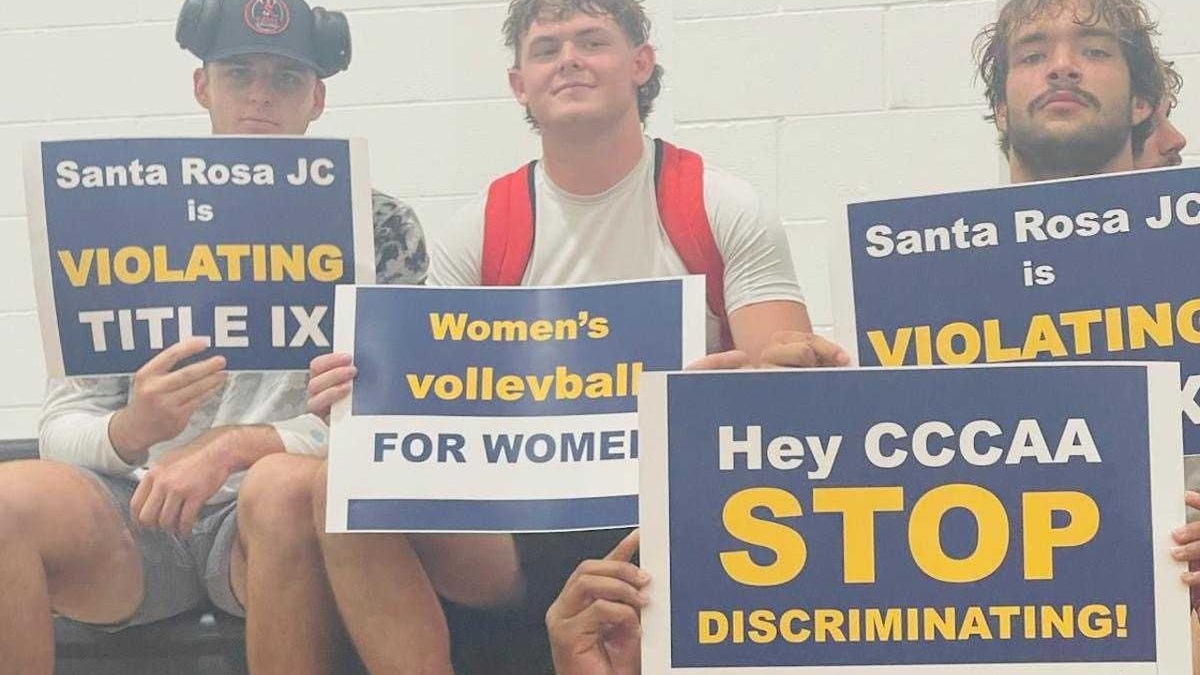 California college students protesting at a women's volleyball game