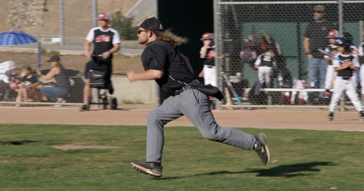 Teen umpire goes viral for energy he brings to little league games