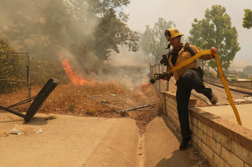 Brush fire threatens homes in Southern California's Simi Valley