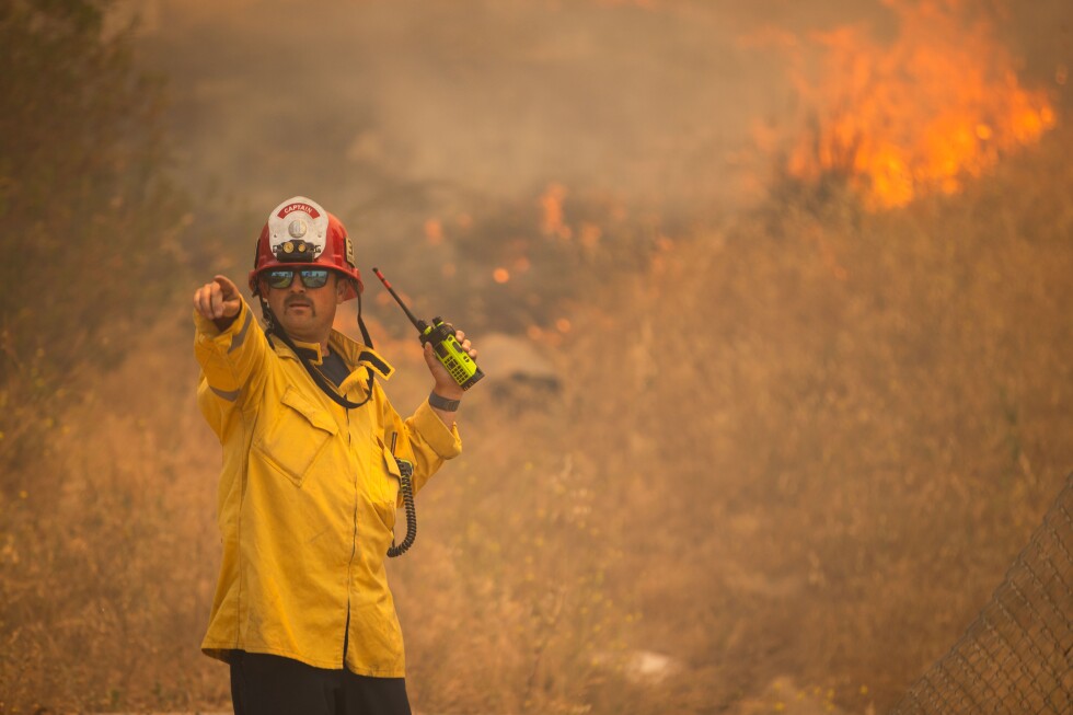 Photos show firefighters battling Southern California blaze
