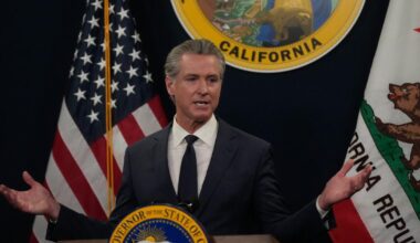 Immigrant rights advocates rally for more state healthcare funding, criticize Newsom