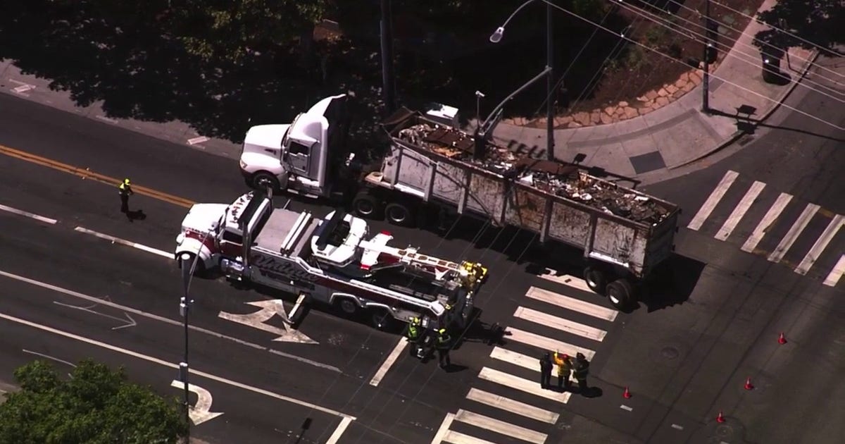 Damaged scrap metal truck shuts down traffic, threatens power outage in San Jose