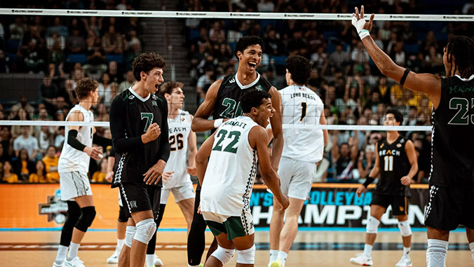 volleyball team celebrates
