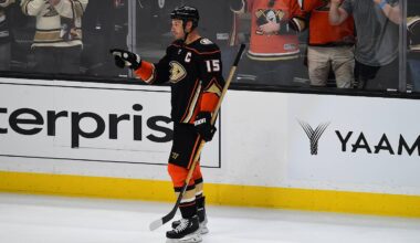 Apr 24, 2022; Anaheim, California, USA; Anaheim Ducks center Ryan Getzlaf (15) celebrates the goal scored by center Adam Henrique (14) against the St. Louis Blues during the third period at Honda Center. Getzlaf provided his final assist on the goal. Mandatory Credit: Gary A. Vasquez-Imagn Images