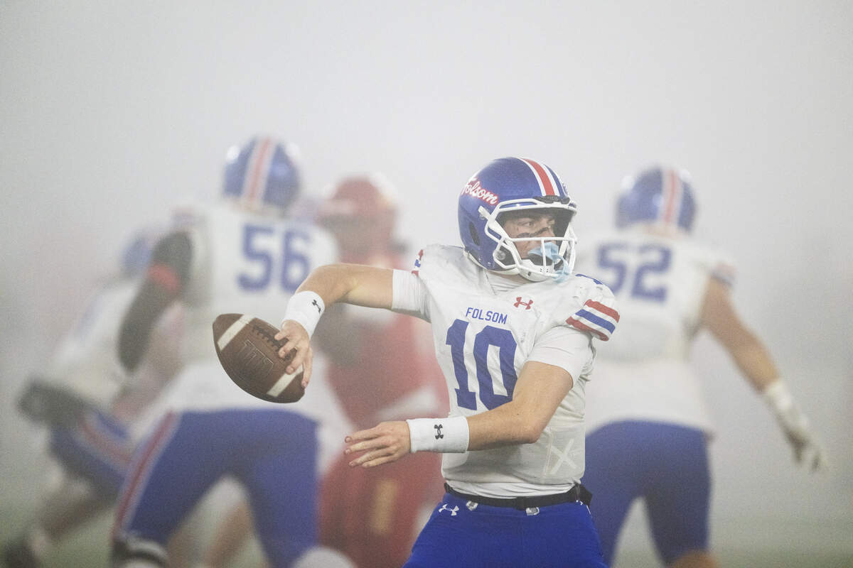 The Folsom Bulldogs' Brody Rudnicki (10) throws a pass in the first half of the CIF Division 1–AA State Championship football game against the Cathedral Catholic Dons at Saddleback College in Mission Viejo on Friday, Dec. 12.