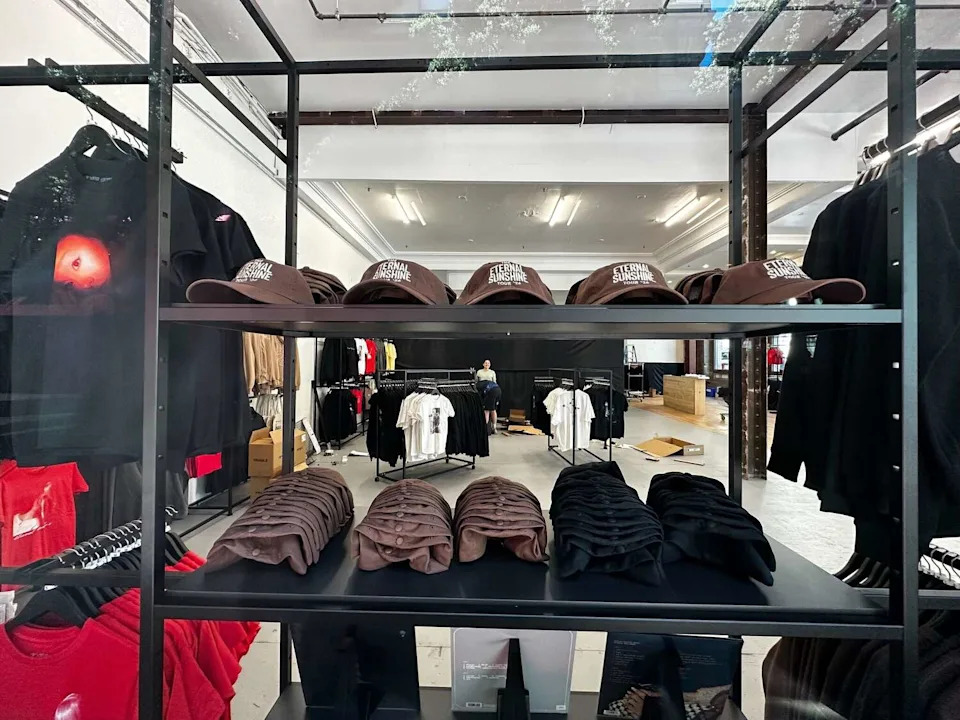 The pop-up shop appears to be selling hats, T-shirts, hoodies and more. (Christian Leonard)