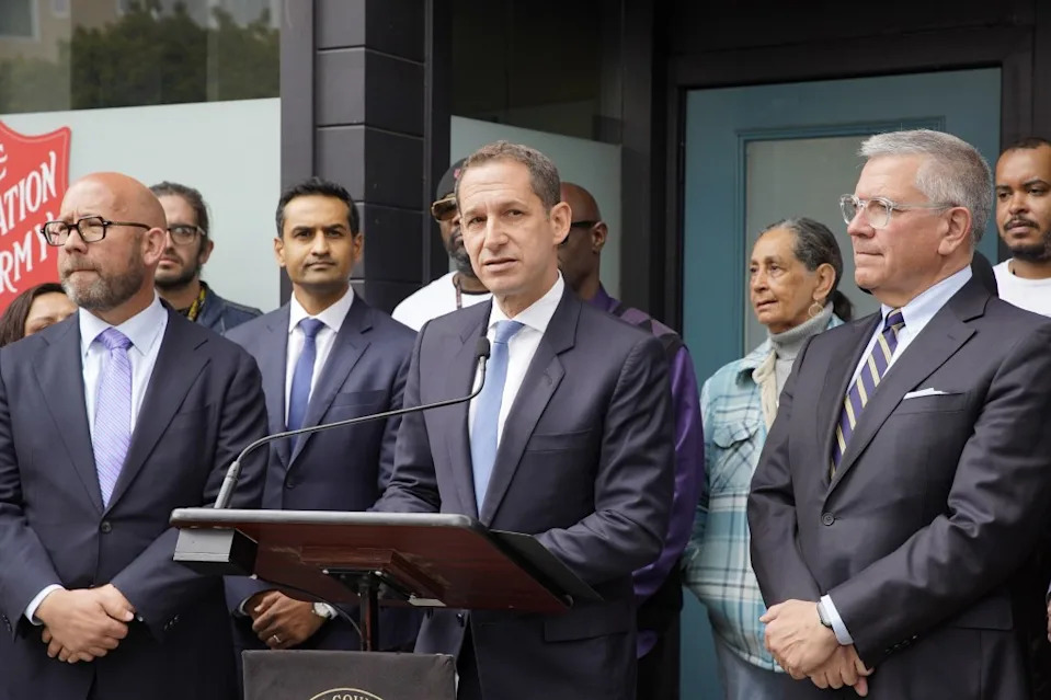 Mayor Daniel Lurie, centre, speaking at a press conference at a sober homeless shelter in San Francisco. AP
