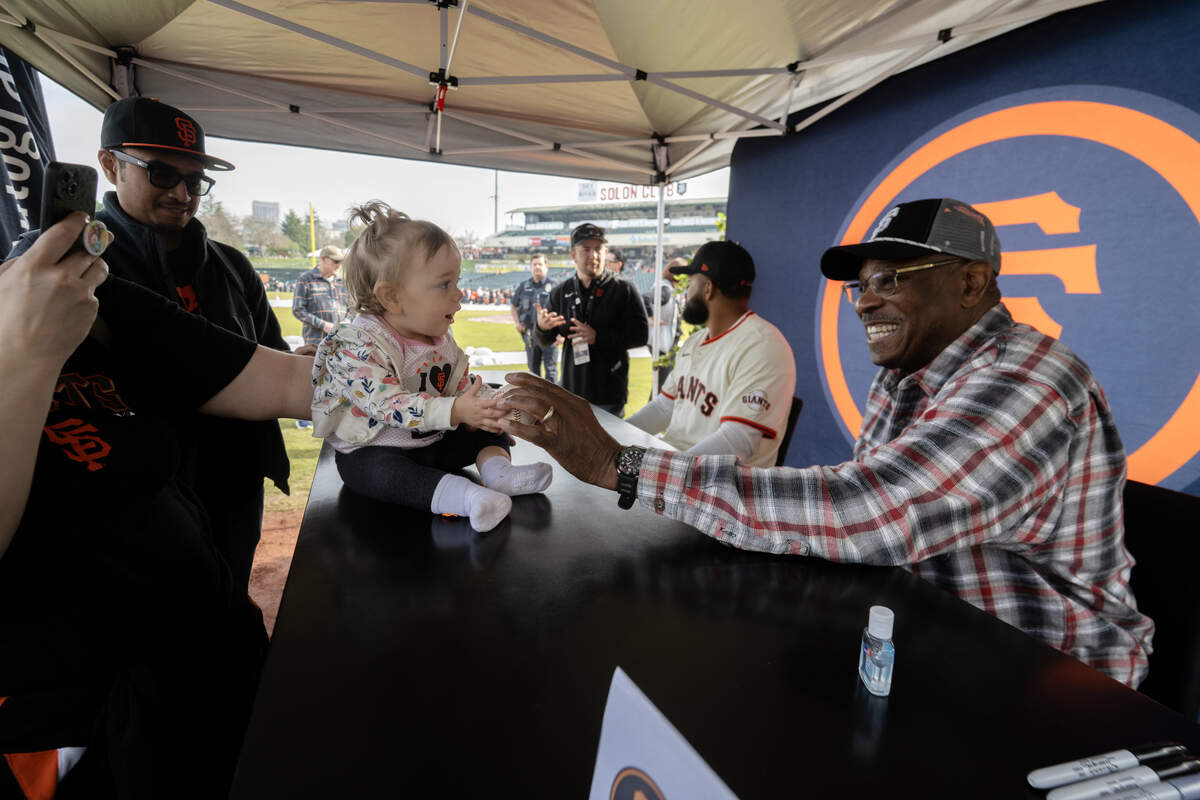 Former Giants manager Dusty Baker shares a moment with Jordyn Gant of Vacaville at the San Francisco Giants Fanfest, at Sutter Health Park on Saturday, Jan. 31, 2026, in West Sacramento.