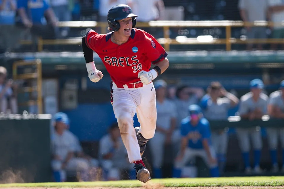 Saint Mary's College catcher Ian Armstrong (38) runs to first base after making contact during an NCAA regional championship elimination game between the Saint Mary's College Gaels and UCLA Bruins on May 31, 2026 at Jackie Robinson Stadium in Los Angeles Calif.
