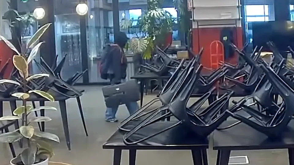 Surveillance video captures a suspect in action at The Lumpia Company in Oakland early Sunday morning.