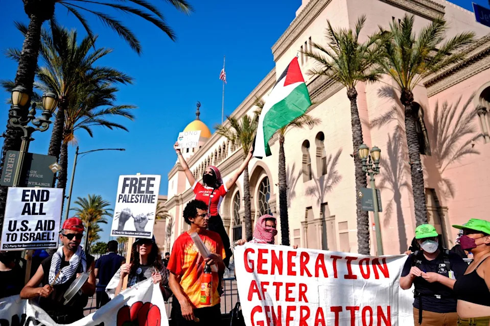 Pro-Palestinian demonstrators rally at the Shrine Auditorium where a commencement ceremony for graduates from Pomona College was being held Sunday, May 12, 2024, in Los Angeles. AP