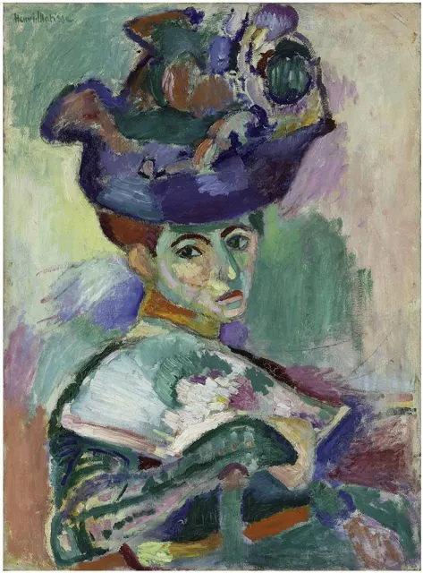 A colorful portrait of a woman in a large hat with abstract, bold brushstrokes, painted by Henri Matisse in the Fauvist style.