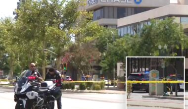 Bakersfield police negotiating with bank robber strapped with bombs