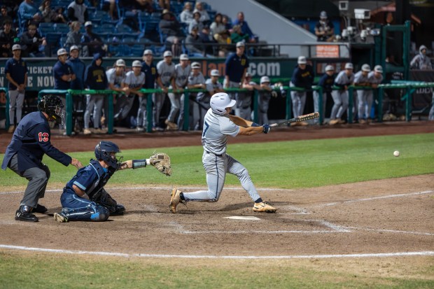 Soquel High shortstop Hudson Summerrill singles against Valley Christian in the CCS Division I championship game at Excite Ballpark in San Jose on Saturday. (Sarah Smith - Santa Cruz Sentinel)
