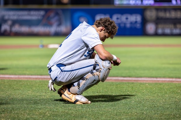 Soquel High catcher Cash Moran is emotional after the Knights' loss to Valley Christian in the CCS Division I championship game at Excite Ballpark in San Jose on Saturday. (Sarah Smith - Santa Cruz Sentinel)
