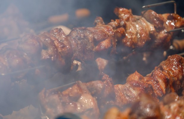 Souvla cooks at the Meze & Cheese Bar at the San Jose Greek Festival at St. Nicholas Greek Orthodox Church in San Jose, Calif., on Sunday, May 31, 2026. (Nhat V. Meyer/Bay Area News Group)