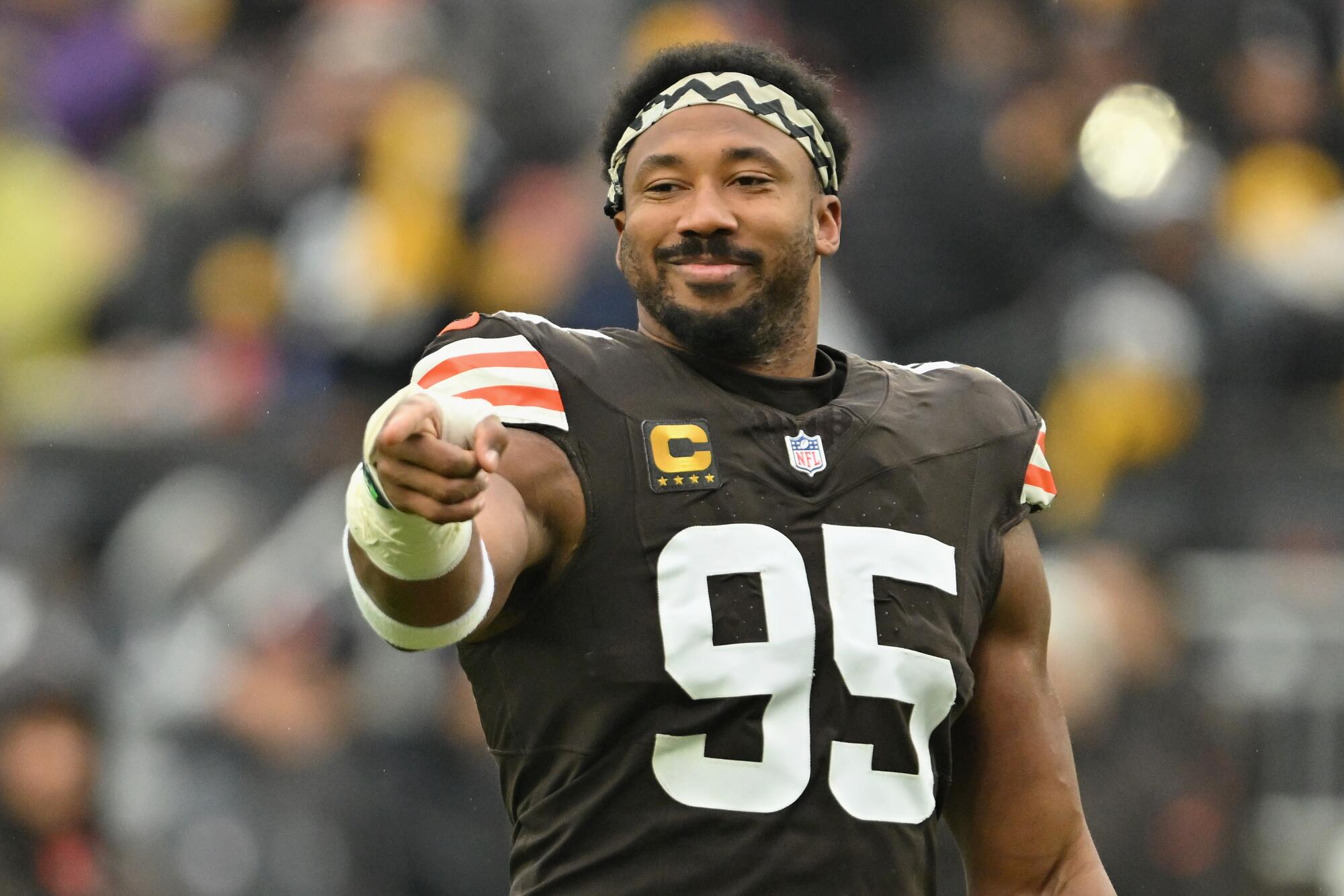 Myles Garrett points before a game between the Cleveland Browns and Pittsburgh Steelers on Dec. 28.
