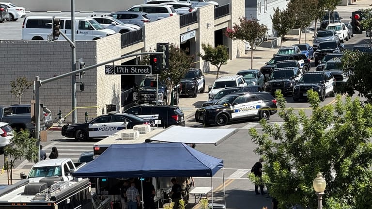 An overhead view shows the scene of a standoff after...