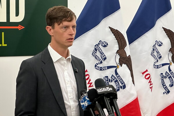 Iowa state Auditor Rob Sand talks to reporters. (AP Photo/Hannah Fingerhut)