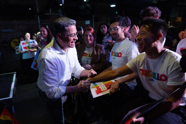 California gubernatorial candidate Xavier Becerra shakes hands with supporters. (AP Photo/Jae C. Hong)