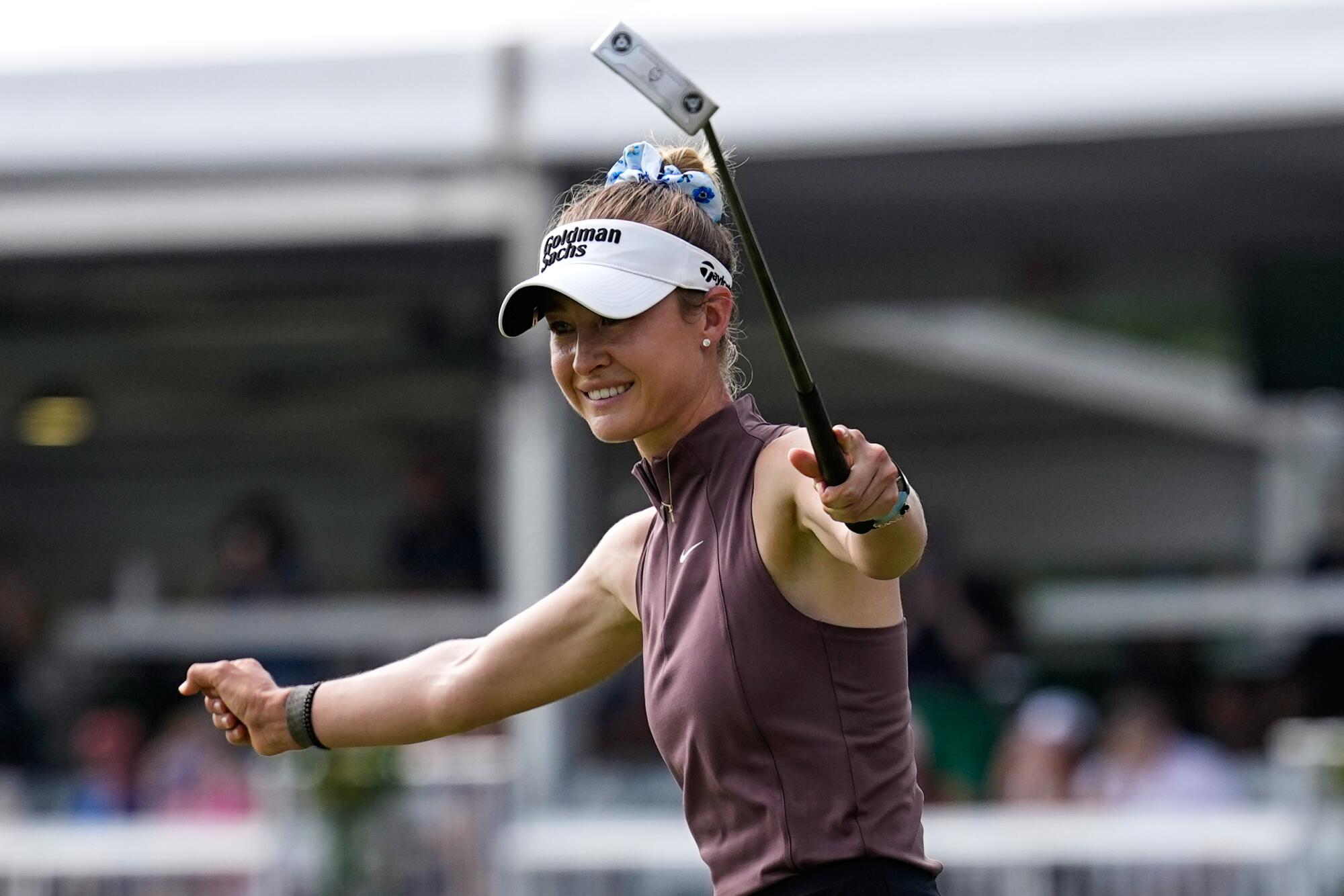 Nelly Korda celebrates after winning the Chevron Championship LPGA golf tournament.