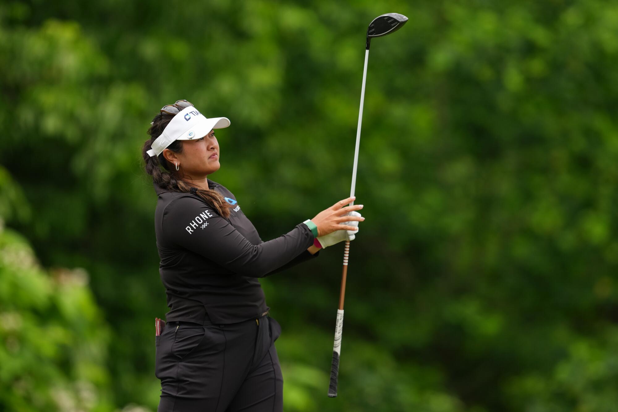 Lilia Vu watches her shot from the seventh tee during the third round of the Queen City Championship on May 16.